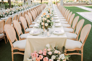  Luxury outdoor wedding banquet with long elegant reception table