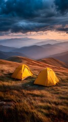 Mountain tents at sunset