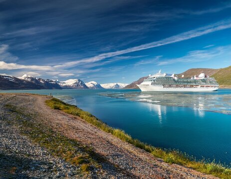 kangerlussuaq airport in greenland with cruise ship on horizon