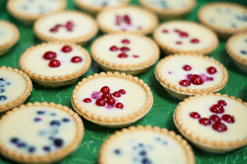 Small tartlets with fruit. Close up. 