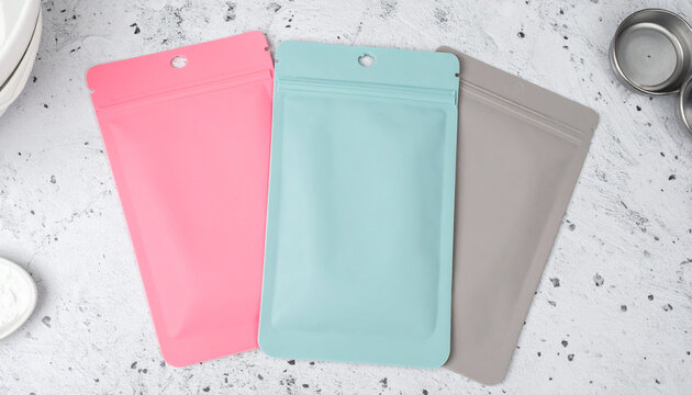 Reusable silicone food bags in vibrant colors on kitchen counter, perfect for storage