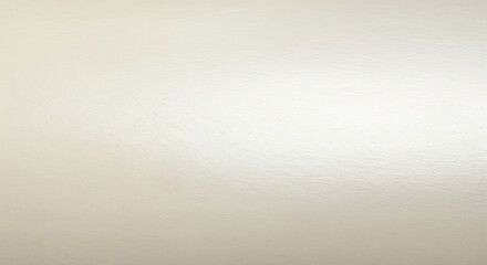 Subtle shimmer and shine illuminates a smooth, neutral beige surface, ideal for backgrounds, textures, and elegant design projects.