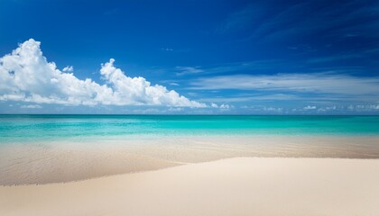 tropical beach with sand sea and blue sky