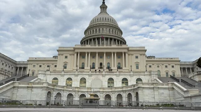U.S. Capitol in Washington D.C. on Capitol Hill in cloudy weather, House of Representatives and Senate building, Rotunda