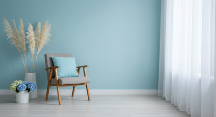 Minimalist interior design with chair, pampas grass and blue accent wall decor
