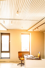 Modern white office with open space and large windows sun sunny