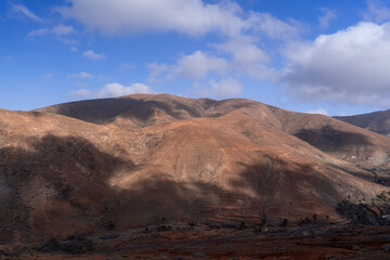 Arid Mountain Landscape under Partly Cloudy Sky, Fuerteventura