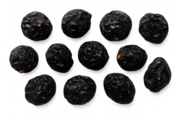 Black peppercorns scattered against transparent surface, highlighting culinary ingredient for professional food styling and graphic design projects