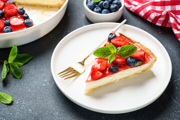 Tart with strawberry and blueberry and cream cheese. Homemade baking.