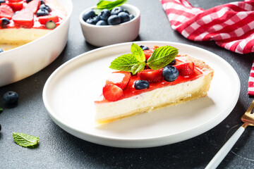 Tart with strawberry and blueberry and cream cheese. Homemade baking.