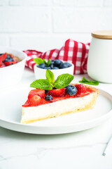Tart with strawberry and blueberry and cream cheese. Homemade baking.