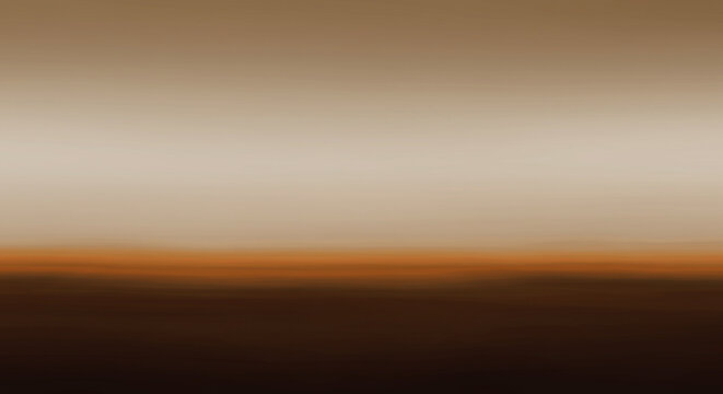 Blurred, muted landscape view of a horizon with soft, warm colors.
