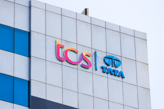 Tata Consultancy Services TCS, sign outside a glass skyscraper, Is a software services company locates its IT and Technology office in Hyderabad, India.