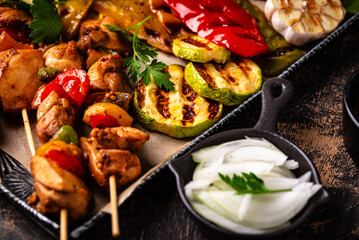 Assortment of grilled bbq meat and vegetables