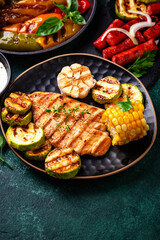 Assortment of grilled bbq meat and vegetables