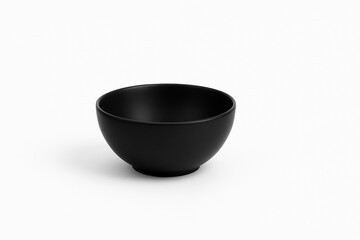 白い背景に置かれたシンプルな黒いボウル