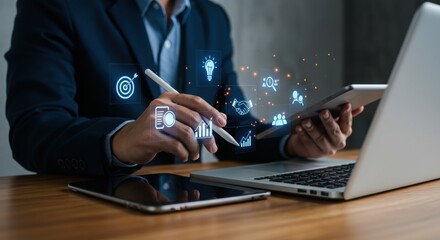 Professional using laptop and tablet with digital icons. Business strategy and technology integration. Modern workspace with digital overlay.