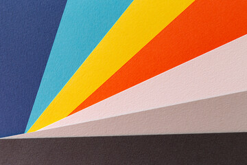 A close-up abstract photograph of coloured paper.