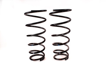 High-performance automotive coil springs designed for enhanced stability and improved handling on...
