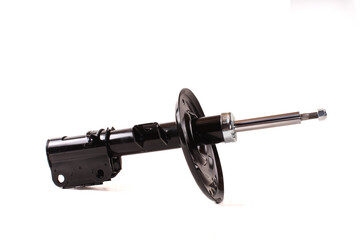 Shock absorber part displayed against a plain background, showcasing automotive component design...