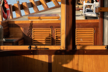 The legacy of Pinisi boat building. Detailed shot of the traditional woodworking techniques used to...