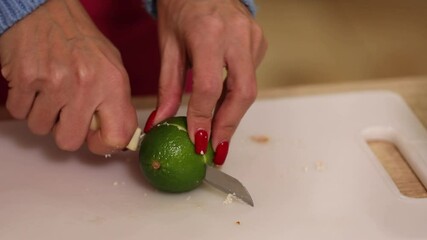 Woman's hand squeezes fresh lime juice over healthy chicken salad in a white bowl. Contains chopped chicken, diced tomatoes, and greens. A perfect light, nutritious meal prepared at home. - Powered by Adobe