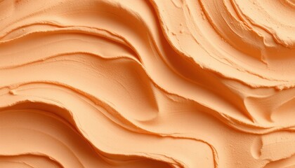 Abstract Close-up of Swirled Orange Frosting or Buttercream Texture