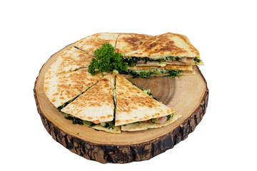 "Spinach and Ham Quesadilla Slices on Wooden Platter"