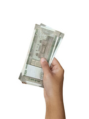 Hand holding a few ₹500 Indian currency notes, finances, economy, savings.