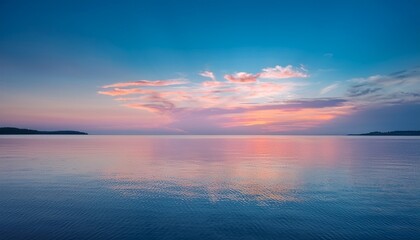 Obraz premium tranquil pastel sunset reflects on calm water