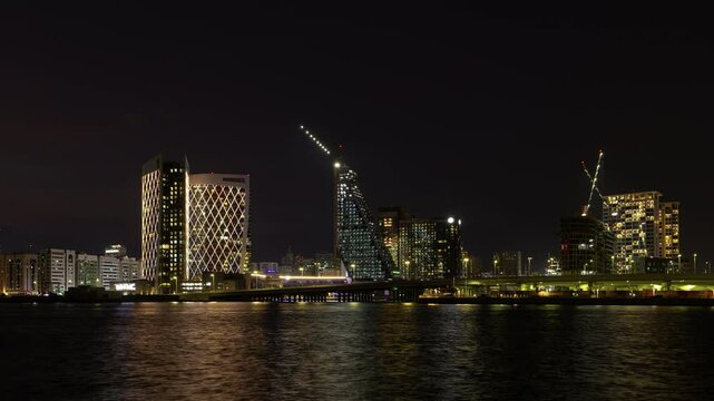 night illumination abu dhabi city bay modern hotel construction exterior traffic bridge road panorama timelapse 4k united arab emirates  