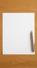 Blank White Paper Sheet with Silver Pen on Wooden Desk Background