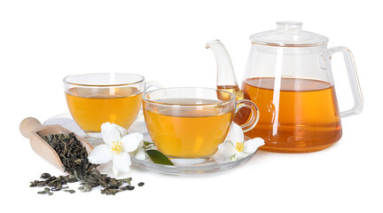 Aromatic jasmine tea in glass cups, teapot, flowers and dried leaves isolated on white