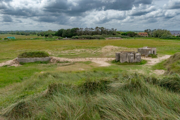 Bunker remains from the Pointe du Hoc defense in Normandy, algae and seaweed