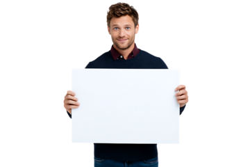 Smiling man holding a blank sign, isolated on black.