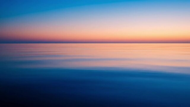 Vibrant Sunset Over Calm Ocean Waters Displaying Blue Orange and Pink Colors