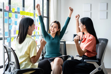 Three women are sitting in chairs