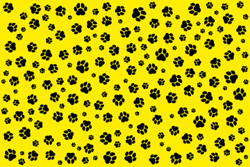 Black paw print background on yellow background