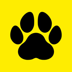 Paw silhouette on a yellow background