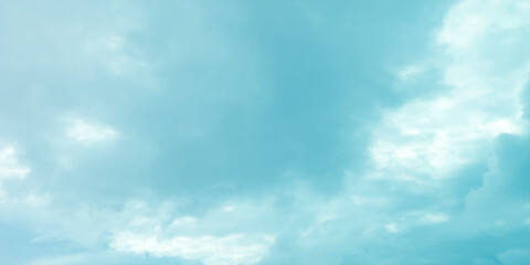 Blue sky, sun, clouds. A peaceful moment with underlying complexity. A reflection of the sky on thin clouds. Hidden emotions beneath a bright exterior like feeling melancholic on a good day background