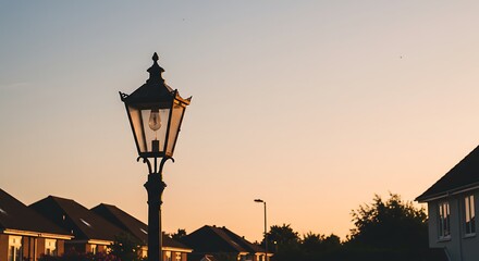 Obraz premium a photo of a lamppost in the late afternoon