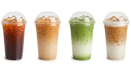 Four different iced drinks in clear plastic cups with dome lids arranged on a white background