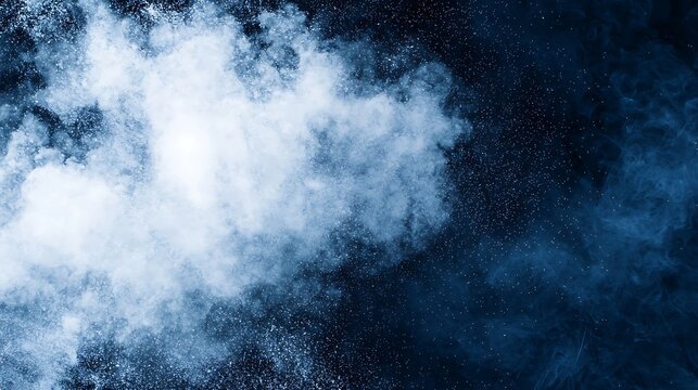 White powder explodes in mid-air against a dark blue background, creating a dynamic cloud of fine particles and dust.