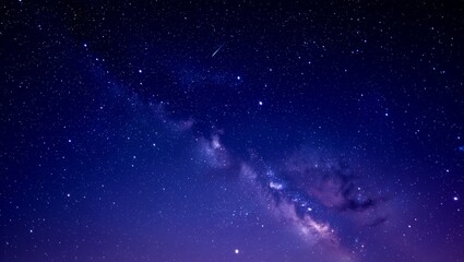 Fototapeta premium Vast starry night sky with milky way galaxy and shooting star