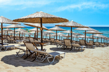 luxurious beach bar with straw umbrellas
