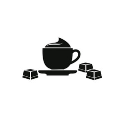 Black coffee cup with whipped cream and chocolates saucer