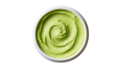 Creamy green dip in a white bowl, perfect for snacks and appetizers, isolated on a white background.