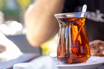 turkish cup of tea with breakfast teapot	