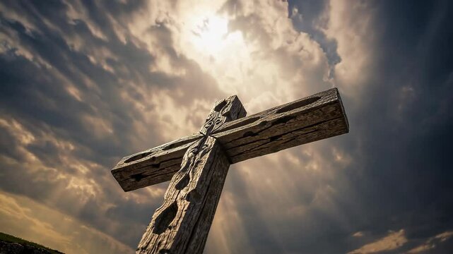 holy cross symbolizing the death and resurrection of Jesus Christ with The sky over Golgotha Hill is shrouded in light and clouds
