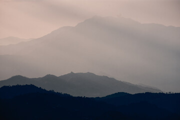 Layered Mountains at Sunrise